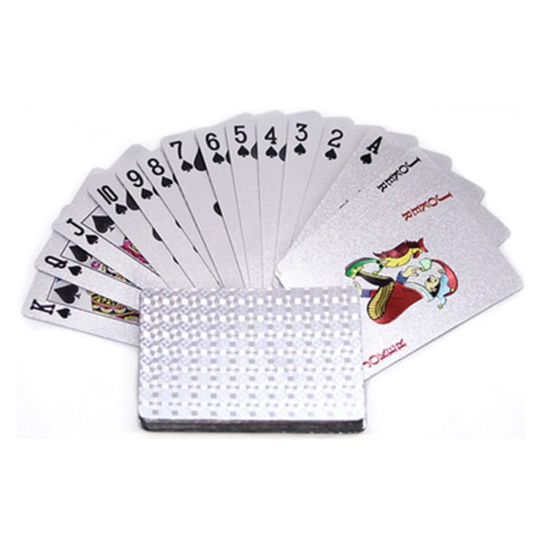 silver and gold plastic poker playing card 7